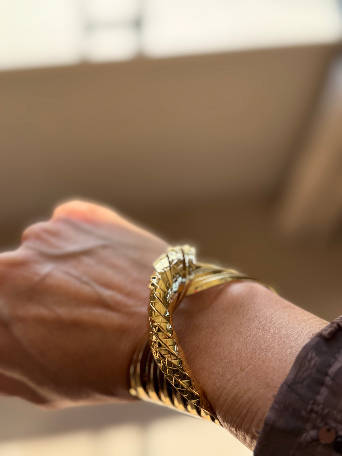 Armband swirl goud