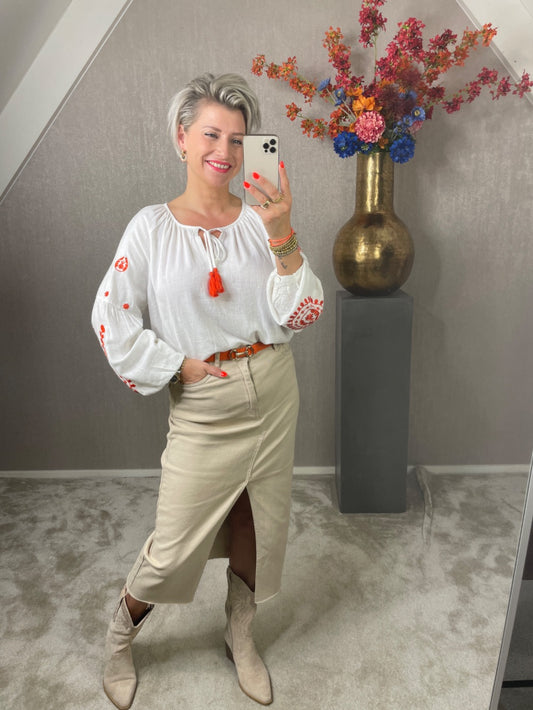 Blouse oranje kwastjes